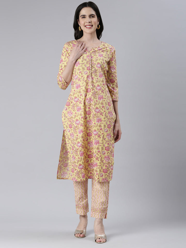 Neerus Yellow printed straight kurta set with trousers - front view