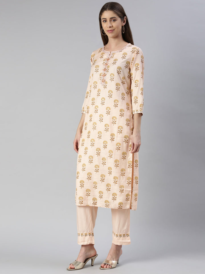 Neerus Orange rayon printed kurta set with trouser and dupatta - back view