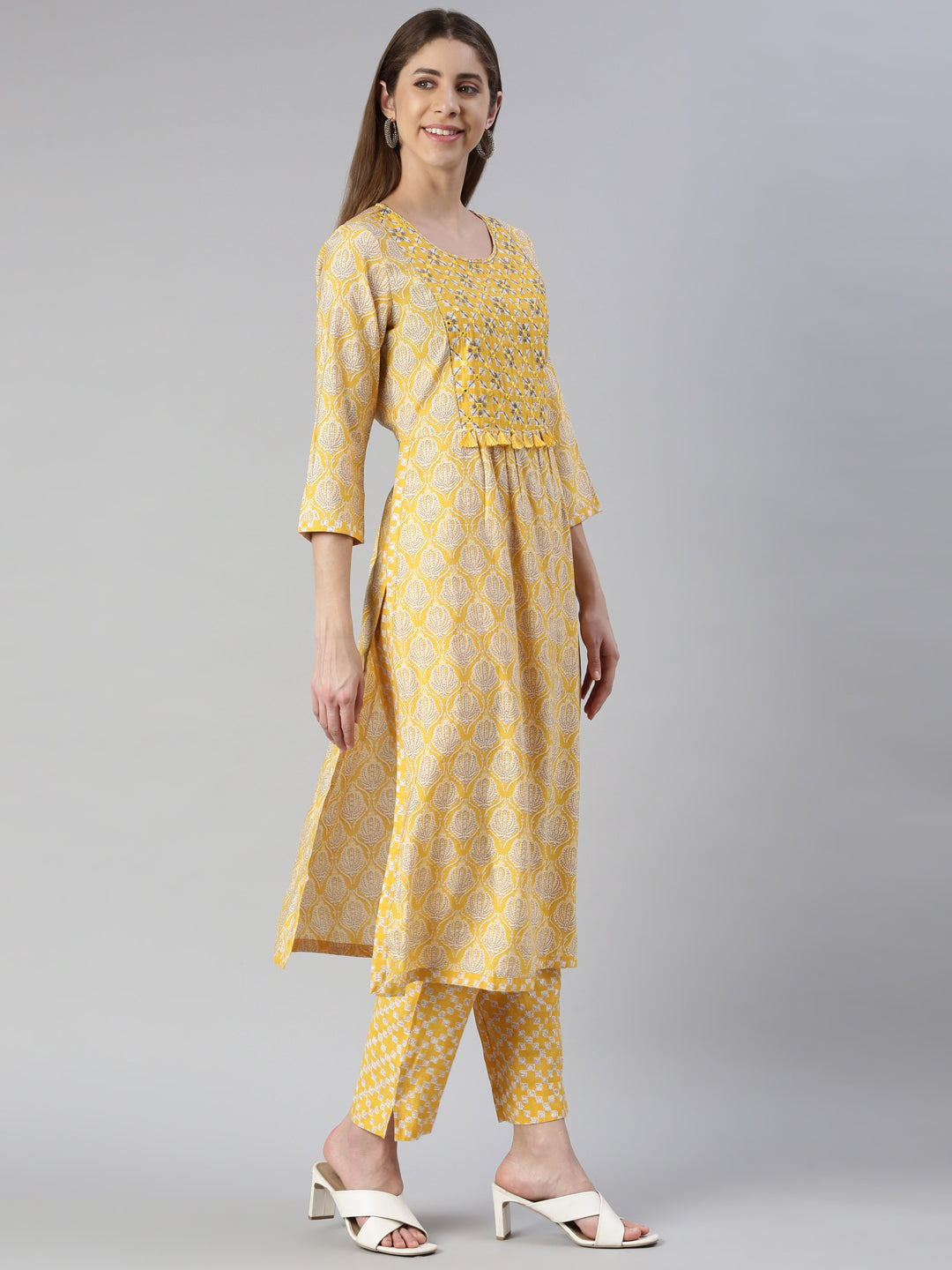 Neerus Yellow rayon embroidered kurta set - back view