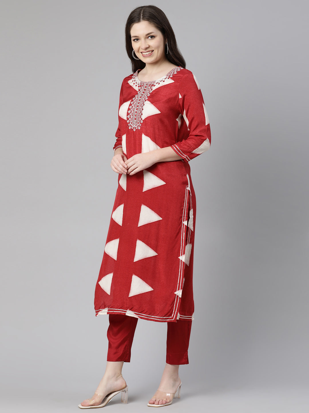 Neerus Red cotton solid kurta set with trouser and dupatta - back view