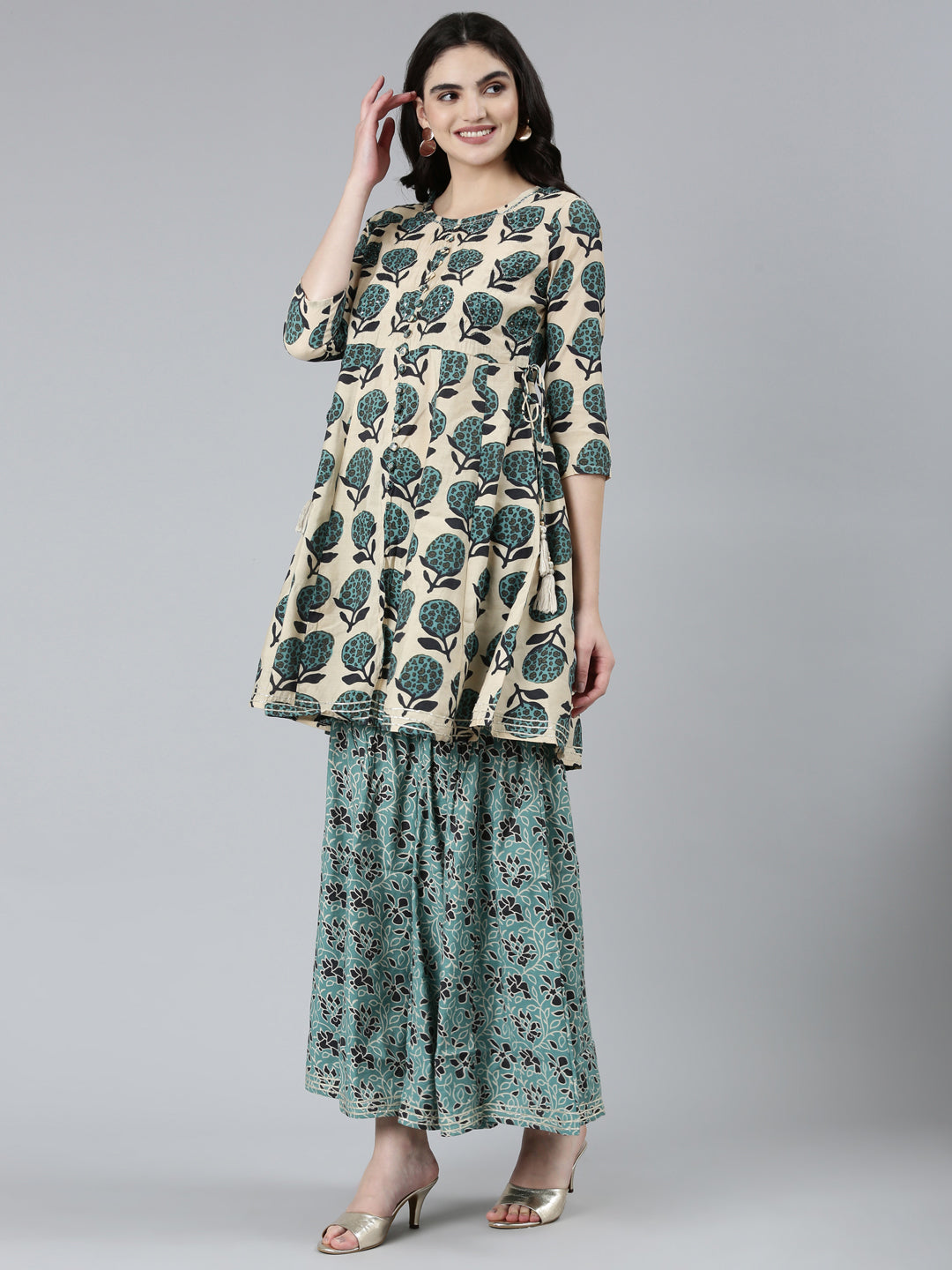 Neerus Green raw silk printed kurta set with sharara and dupatta - back view