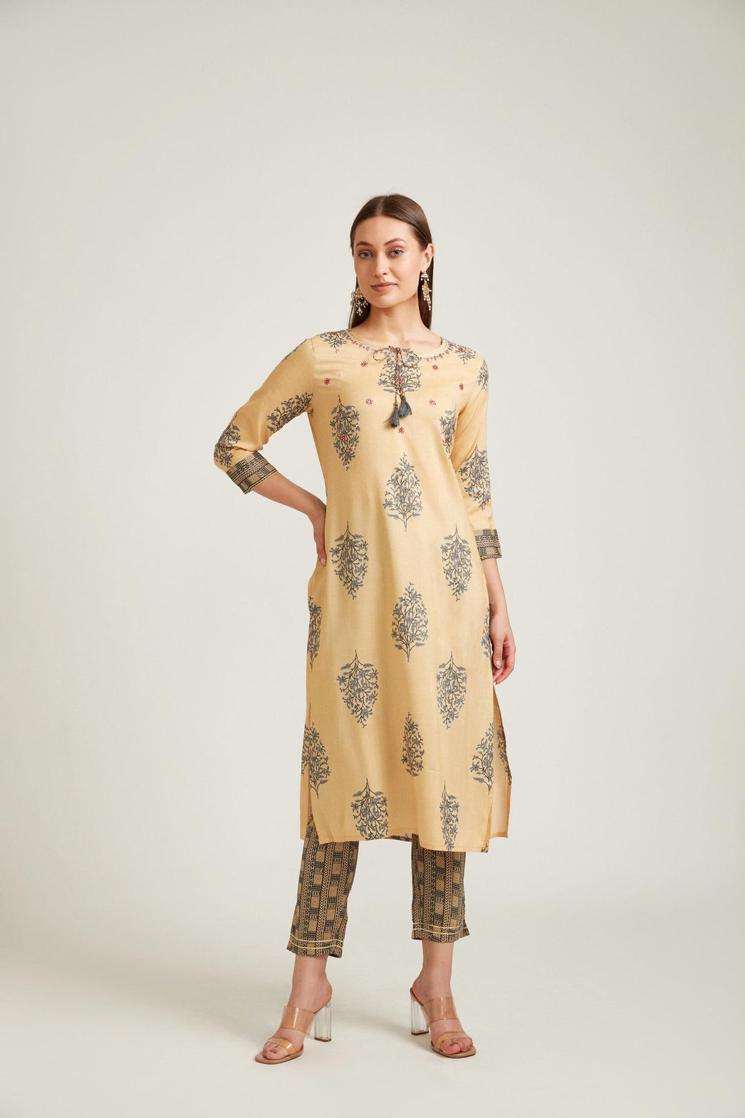 Neerus Yellow viscose rayon straight kurta set - back view