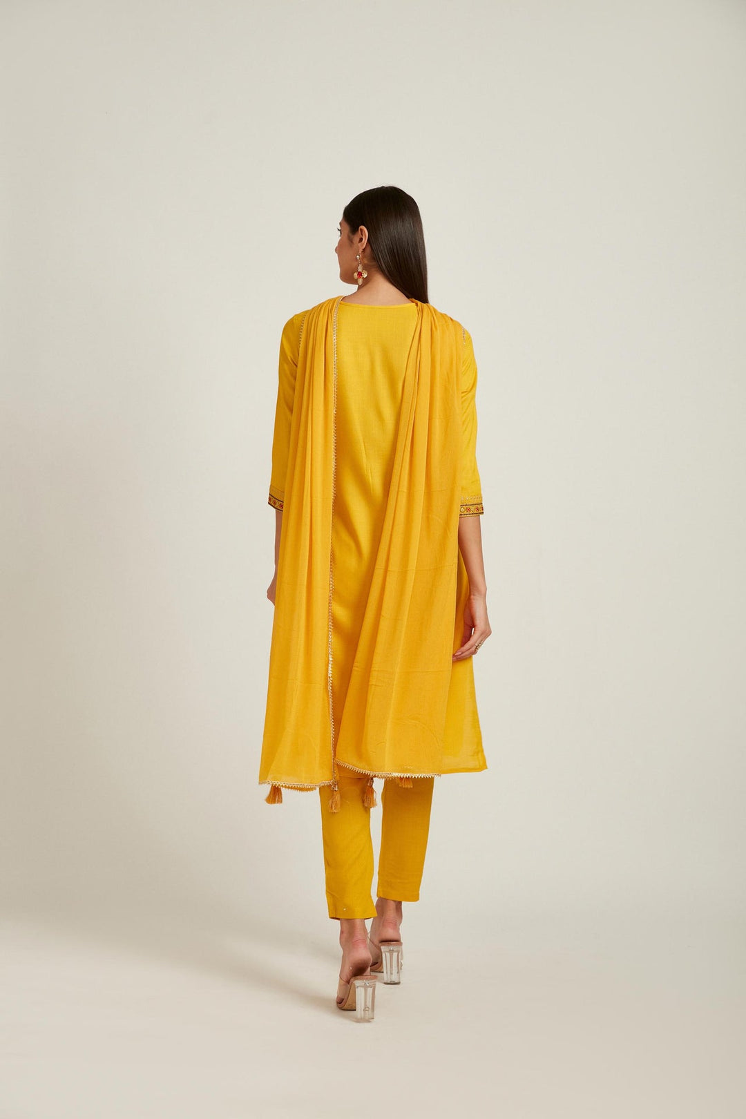 Neerus Yellow rayon straight kurta set - side view