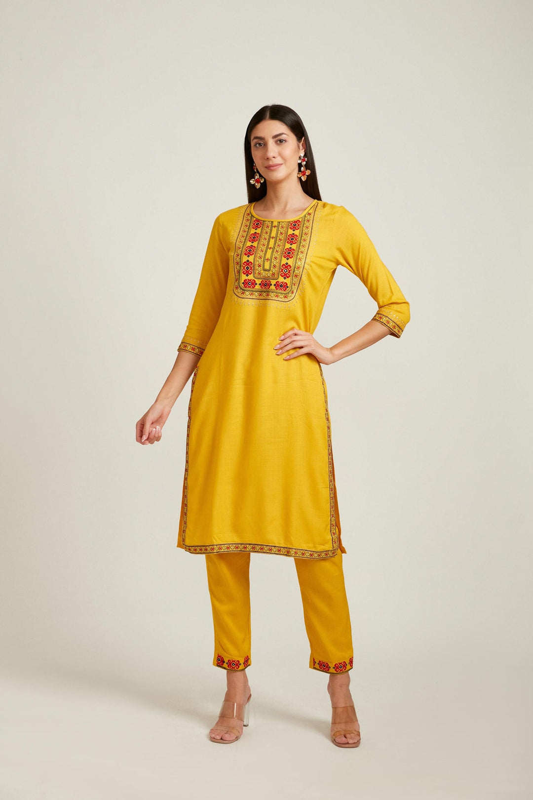 Neerus Yellow rayon straight kurta set - front view