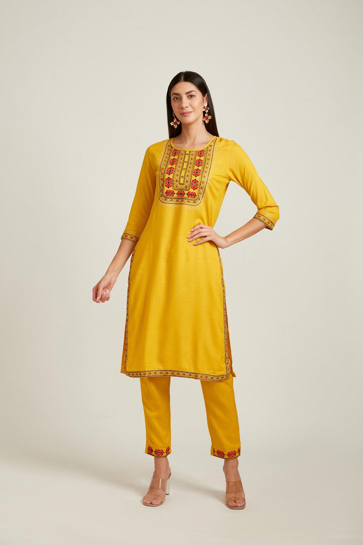 Neerus Yellow rayon straight kurta set - front view