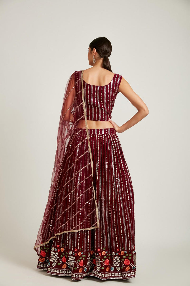 Neerus Maroon georgette embellished lehenga choli set - side view