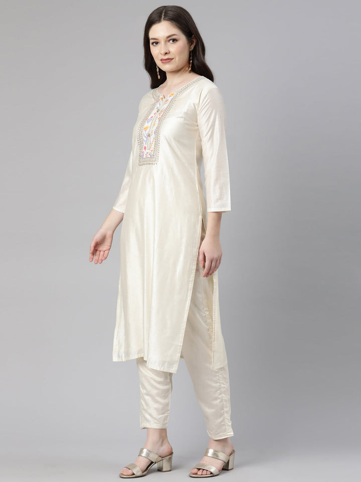 Neerus Beige embroidered kurta set with trouser and dupatta - back view