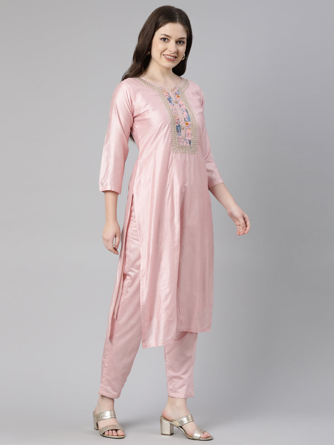 Neerus Orange embroidered kurta set with trouser and dupatta - back view