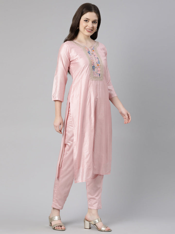 Neerus Orange embroidered kurta set with trouser and dupatta - back view