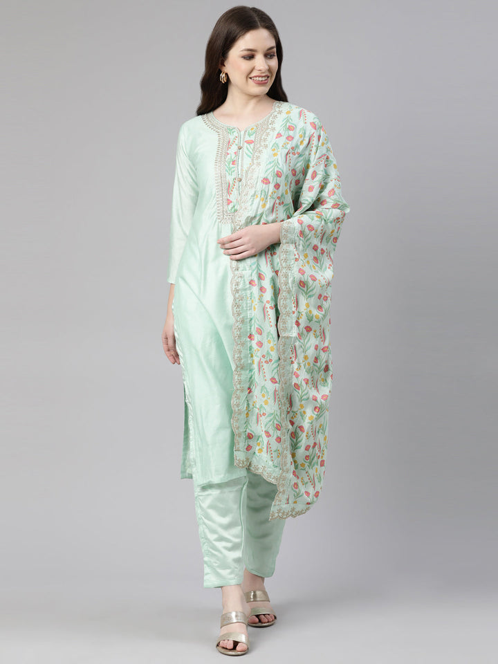 Neerus Green solid straight kurta set with trouser and dupatta - front view