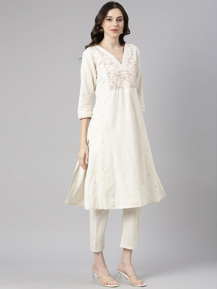 Neerus Cream Casual Solid Straight Kurtas