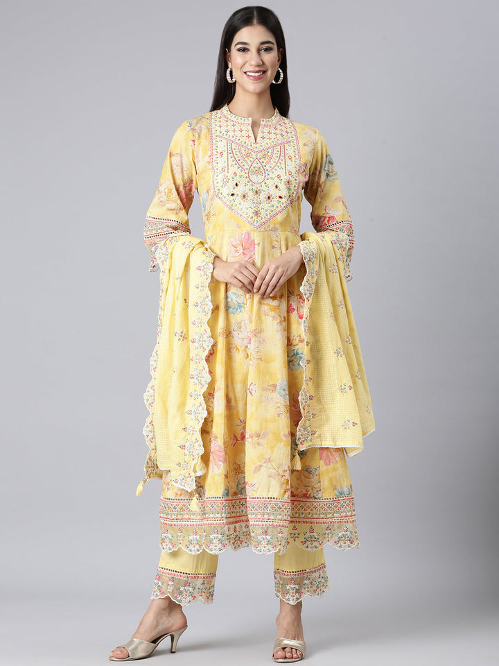 Neerus Yellow cotton embroidered anarkali suit set - front view
