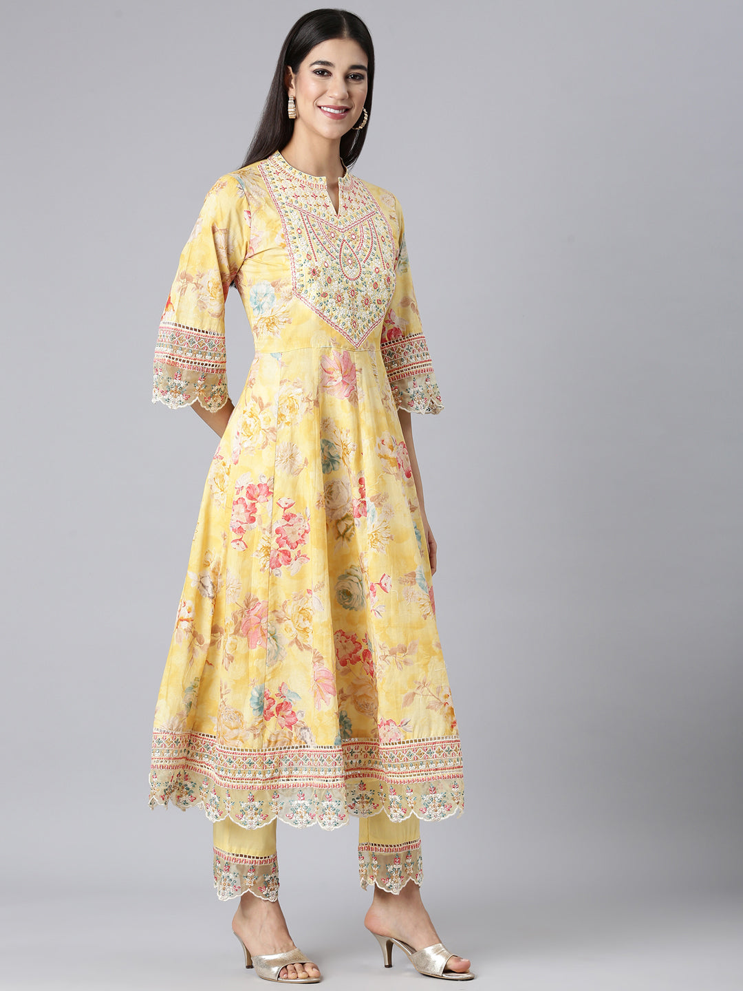 Neerus Yellow cotton embroidered anarkali suit set - back view