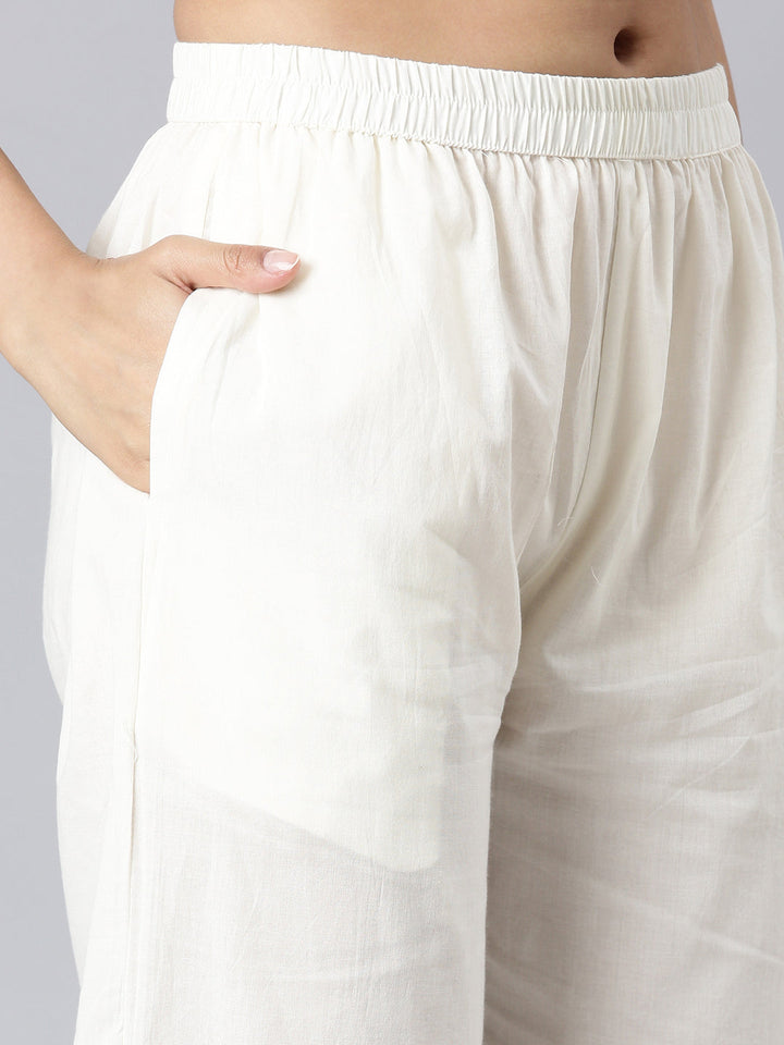 Neerus Off White Solid Curved Kurta and Trousers With Dupatta