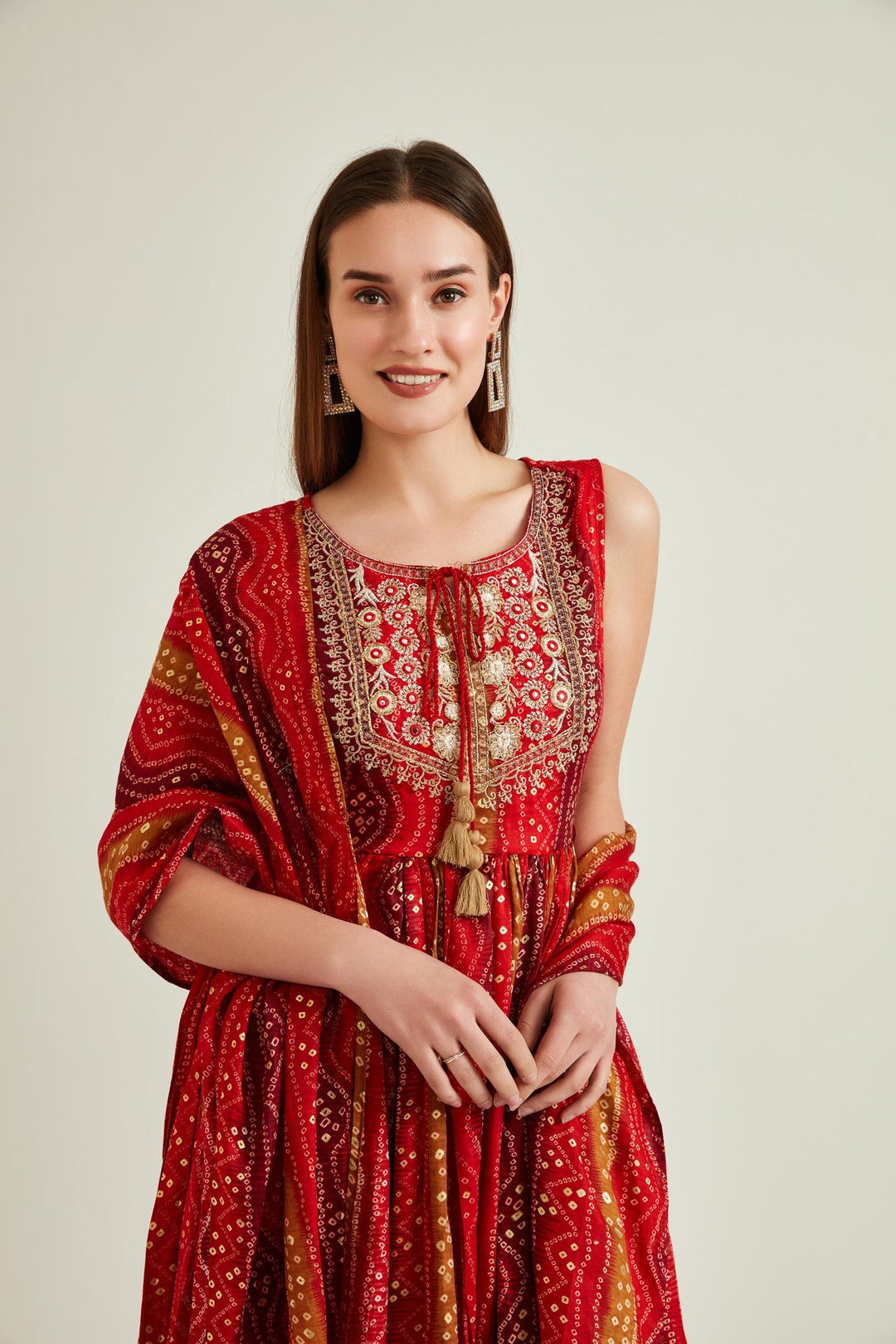 Neerus Red cotton mirror work bandhani kurta set - back view