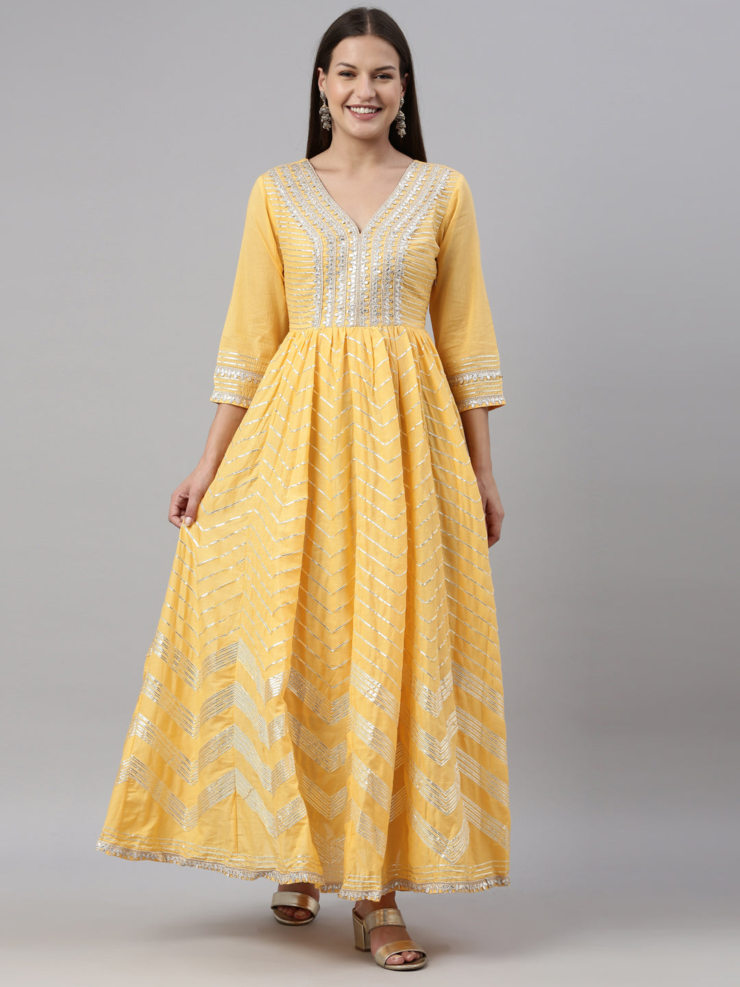 Neerus Yellow cotton embellished anarkali kurti - front view
