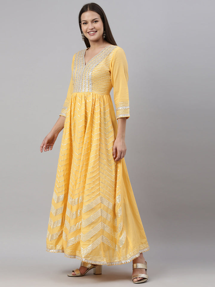 Neerus Yellow cotton embellished anarkali kurti - side view