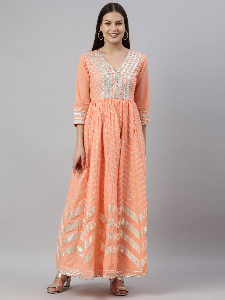 Neerus Orange cotton solid kurti - front view