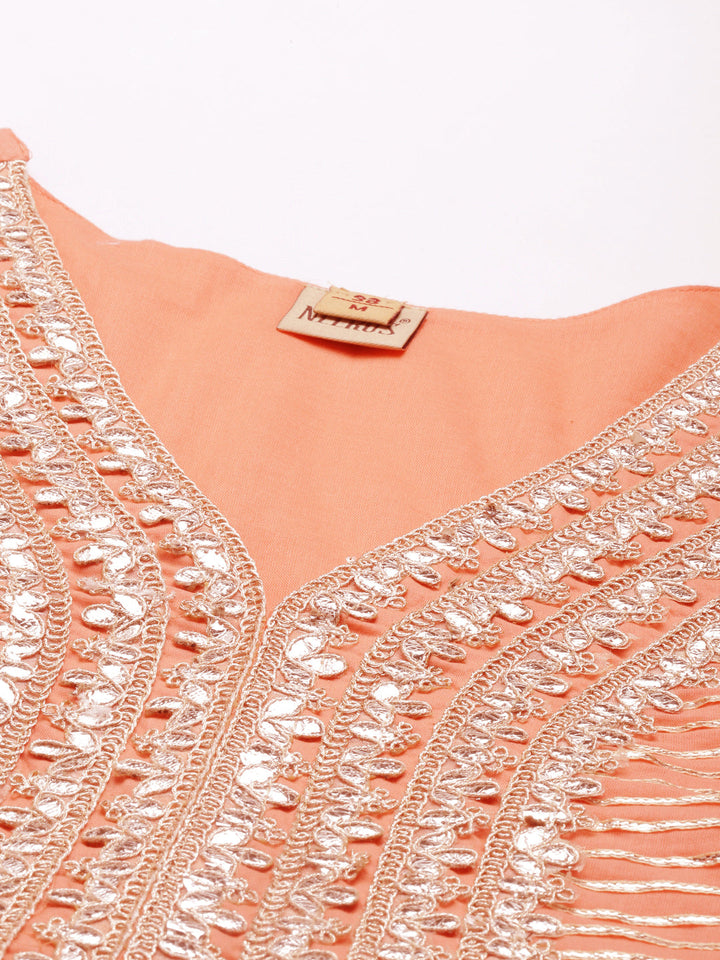 Neerus Orange cotton solid kurti - back view