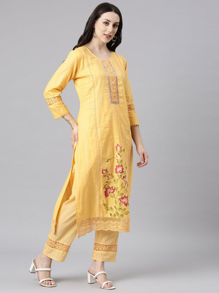 Neerus Orange cotton panelled straight kurta set - back view