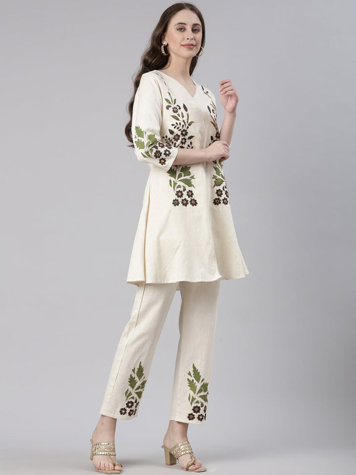 Neerus Cream Casual Embroidered Kurti with Trousers