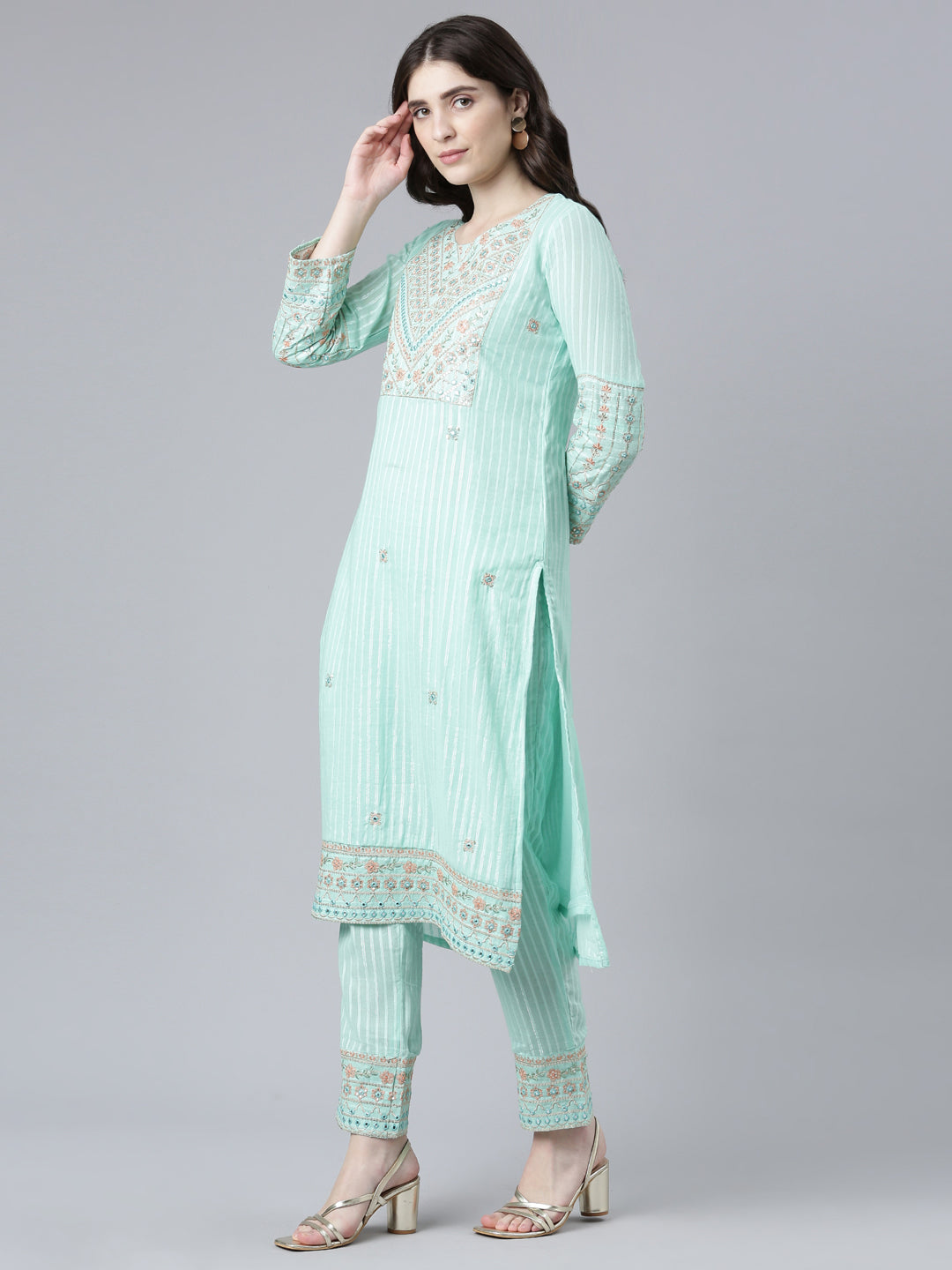 Neerus Green cotton printed kurta set with trouser and dupatta - back view