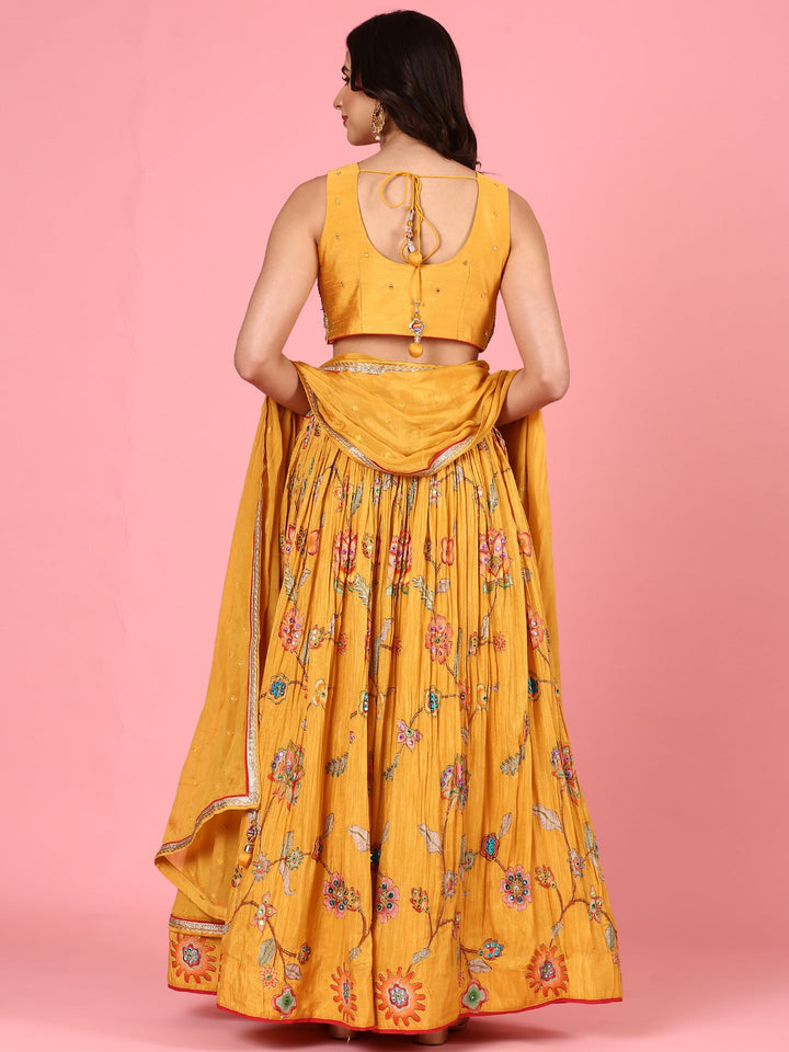 Neerus Yellow georgette embroidered lehenga set - side view