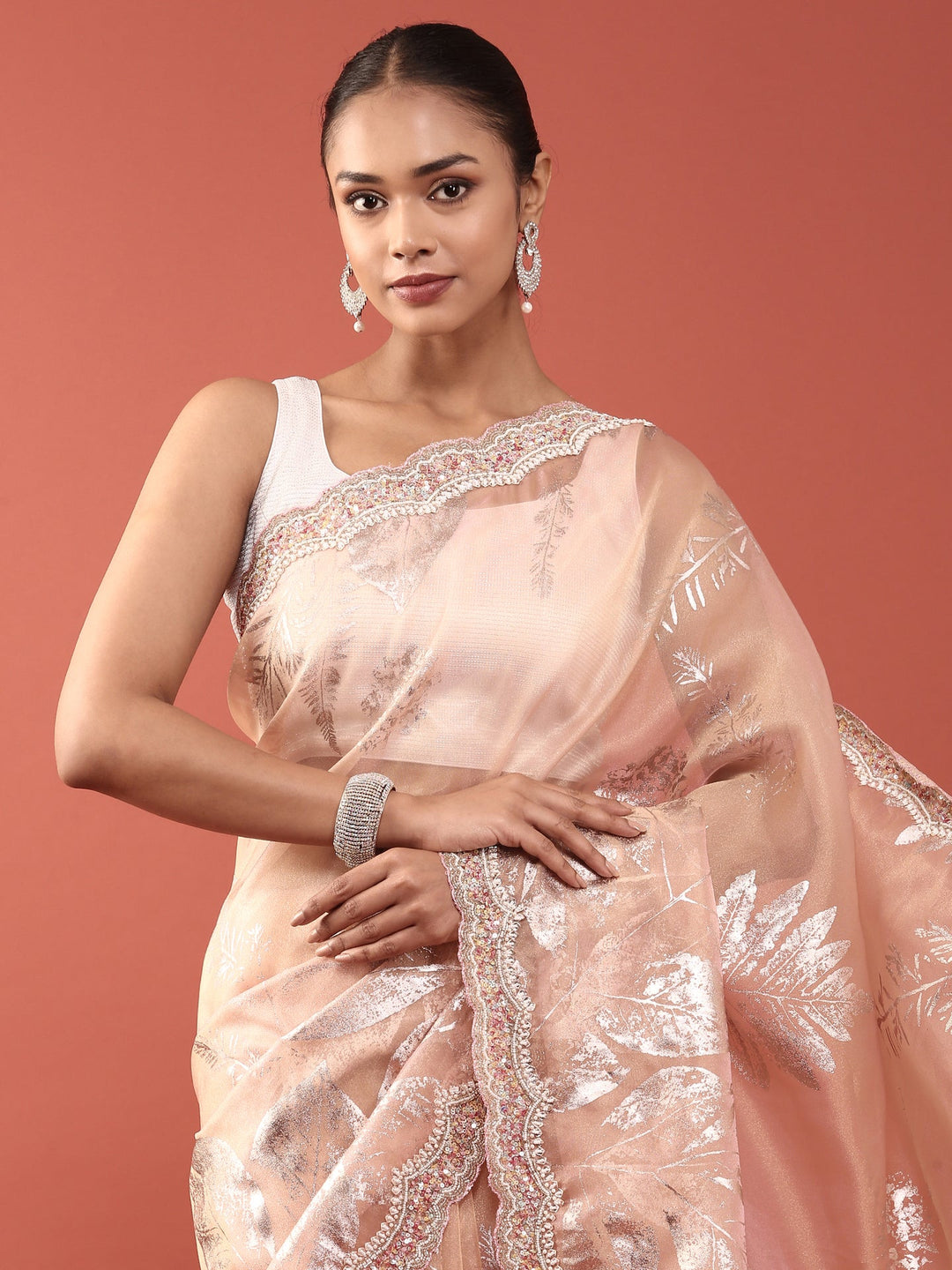Neerus Orange tissue embellished saree - back view