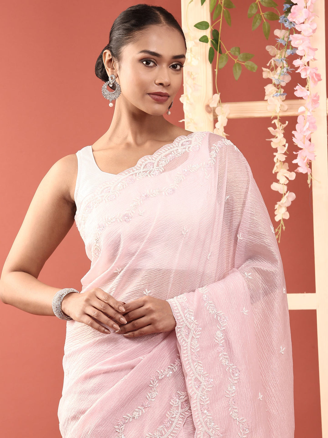 Neerus Pink georgette embellished saree - side view