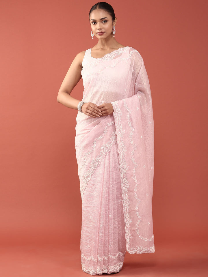 Neerus Pink georgette embellished saree - front view