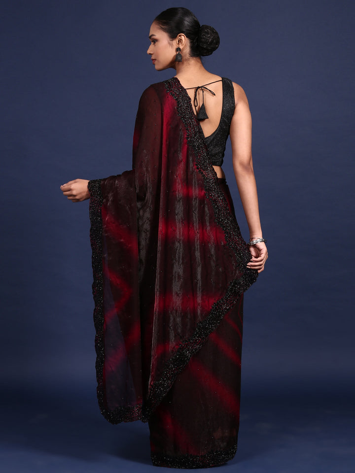 Neerus Maroon embellished shimmer saree - back view