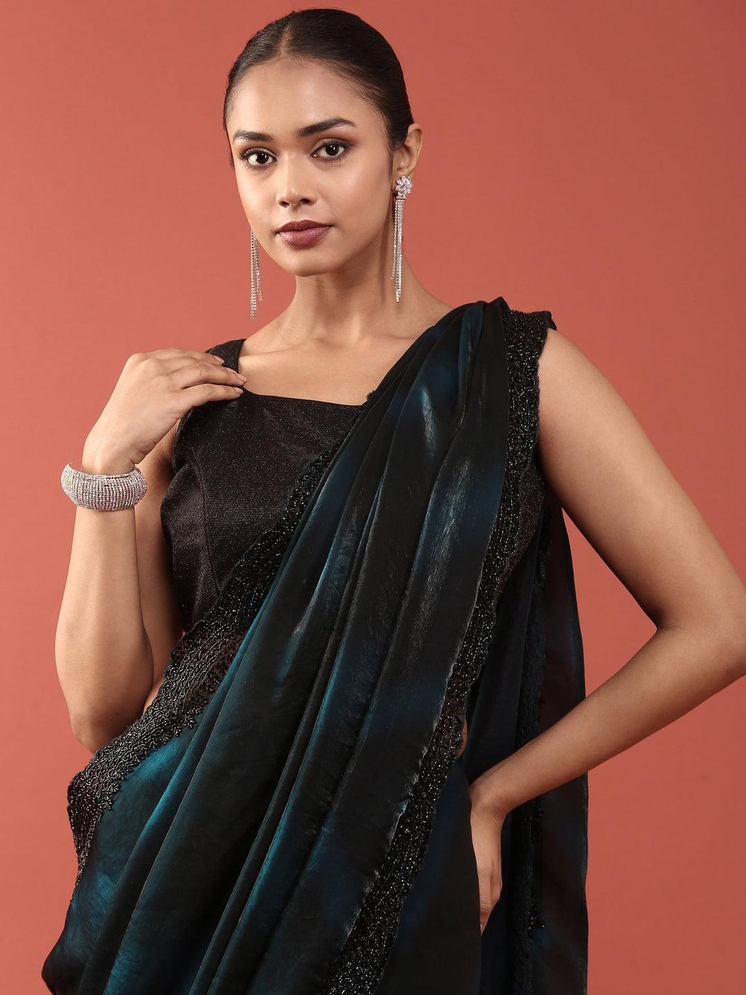 Neerus Blue embellished peacock motif saree - side view
