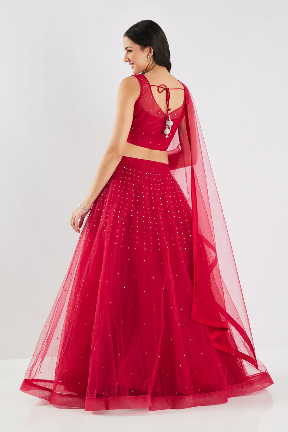 Neerus Maroon net embellished lehenga set - detail view 1