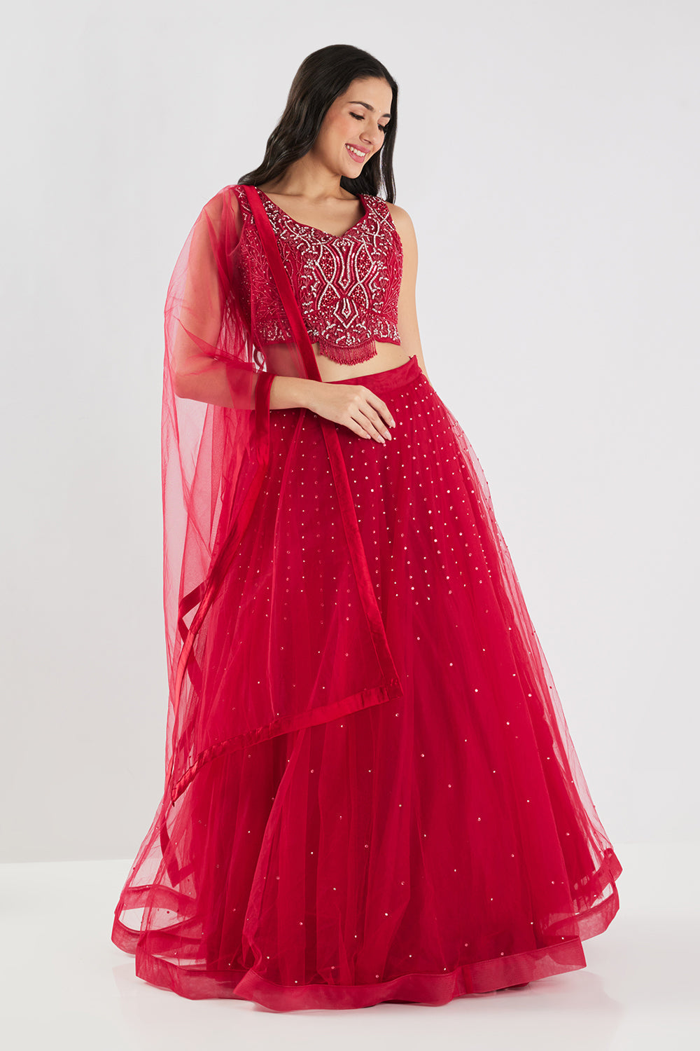 Neerus Maroon net embellished lehenga set - side view