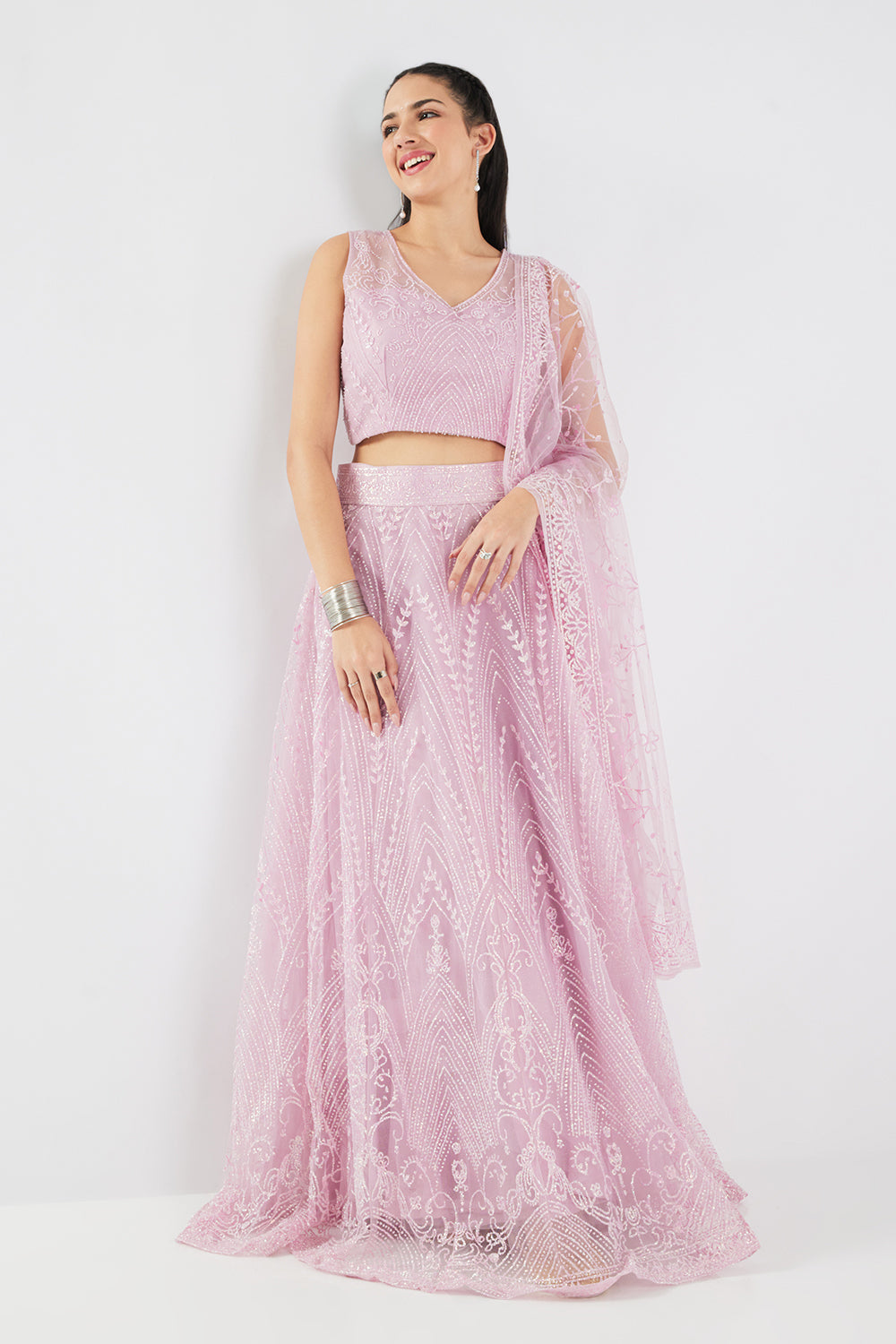 Neerus Pink net embellished lehenga set - side view