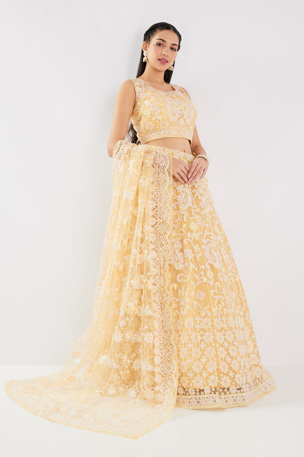 Neerus Yellow net embellished lehenga set - back view