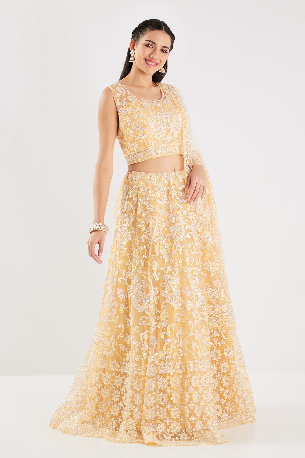 Neerus Yellow net embellished lehenga set - side view