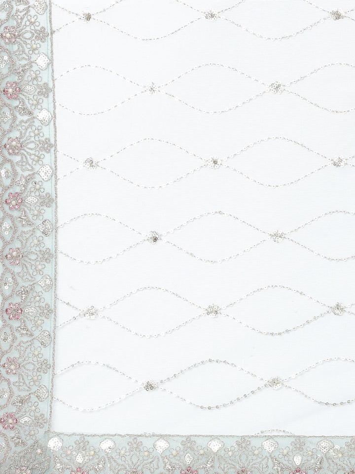 Beige net heavy embroidered three piece ghagra set