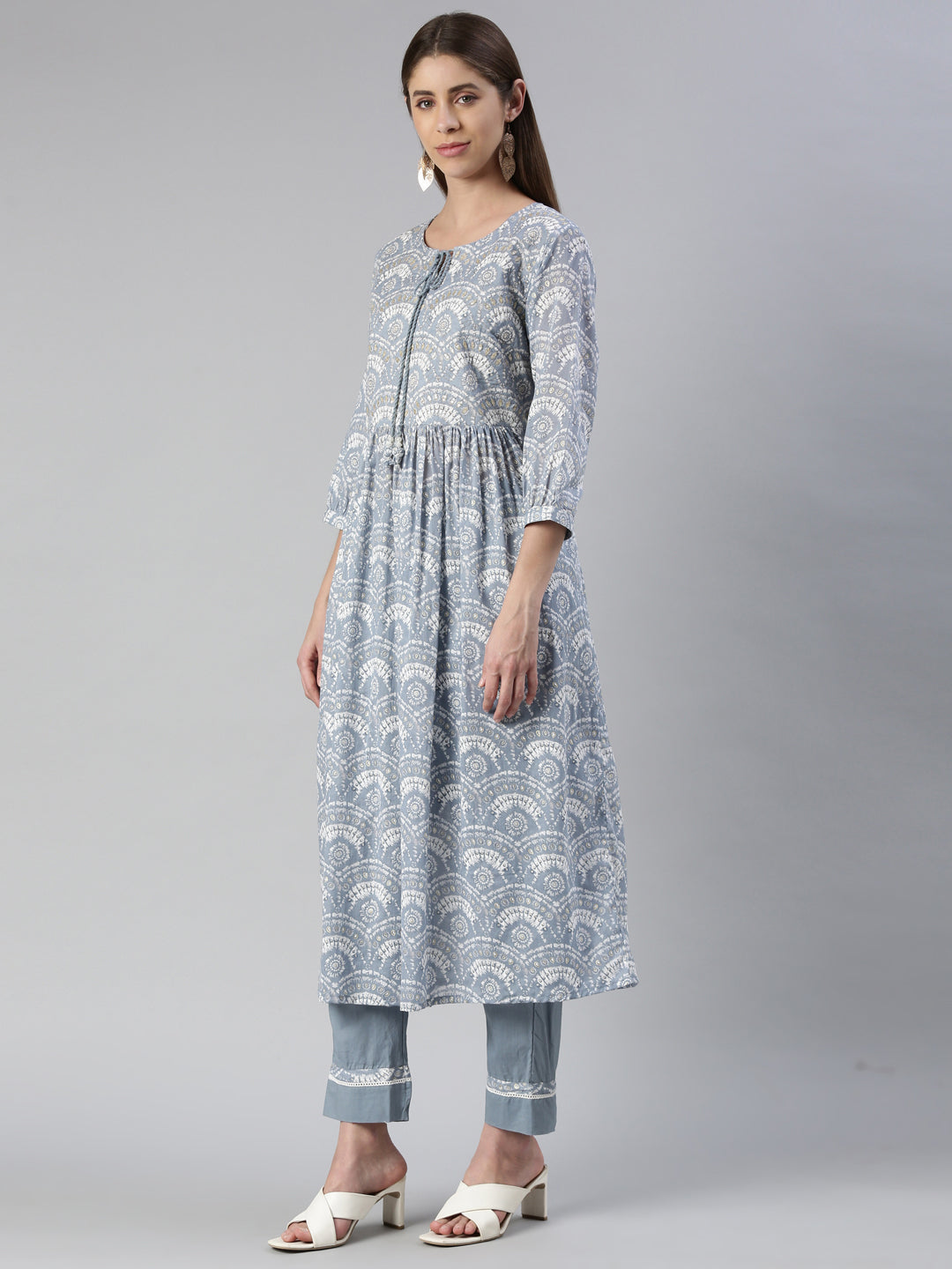 Neerus Blue cotton solid kurta set with trouser and dupatta - back view