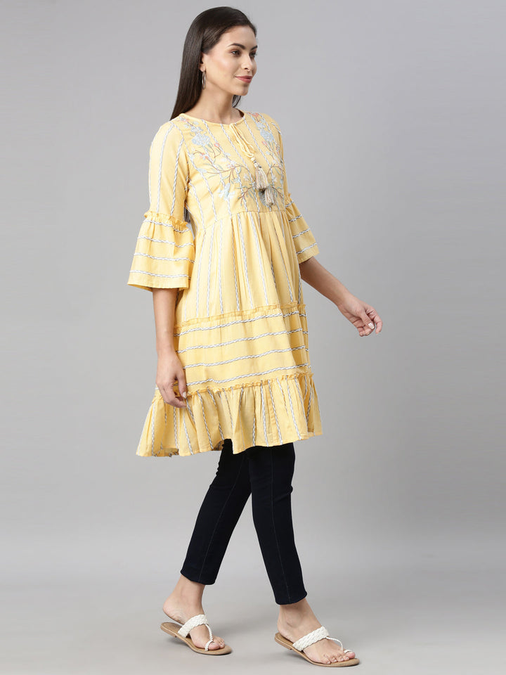 Neerus Yellow floral printed tiered kurti - side view