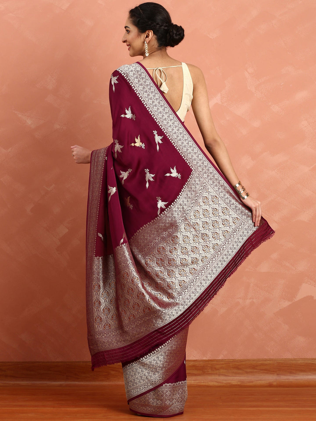 Neerus Maroon Banarasi woven saree with gold silver motifs - side view