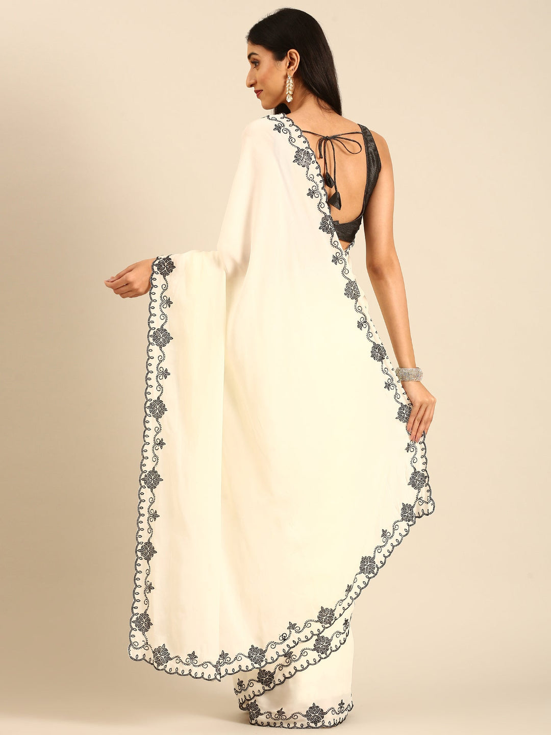 Neerus Beige satin embellished saree with Swarovski border - back view