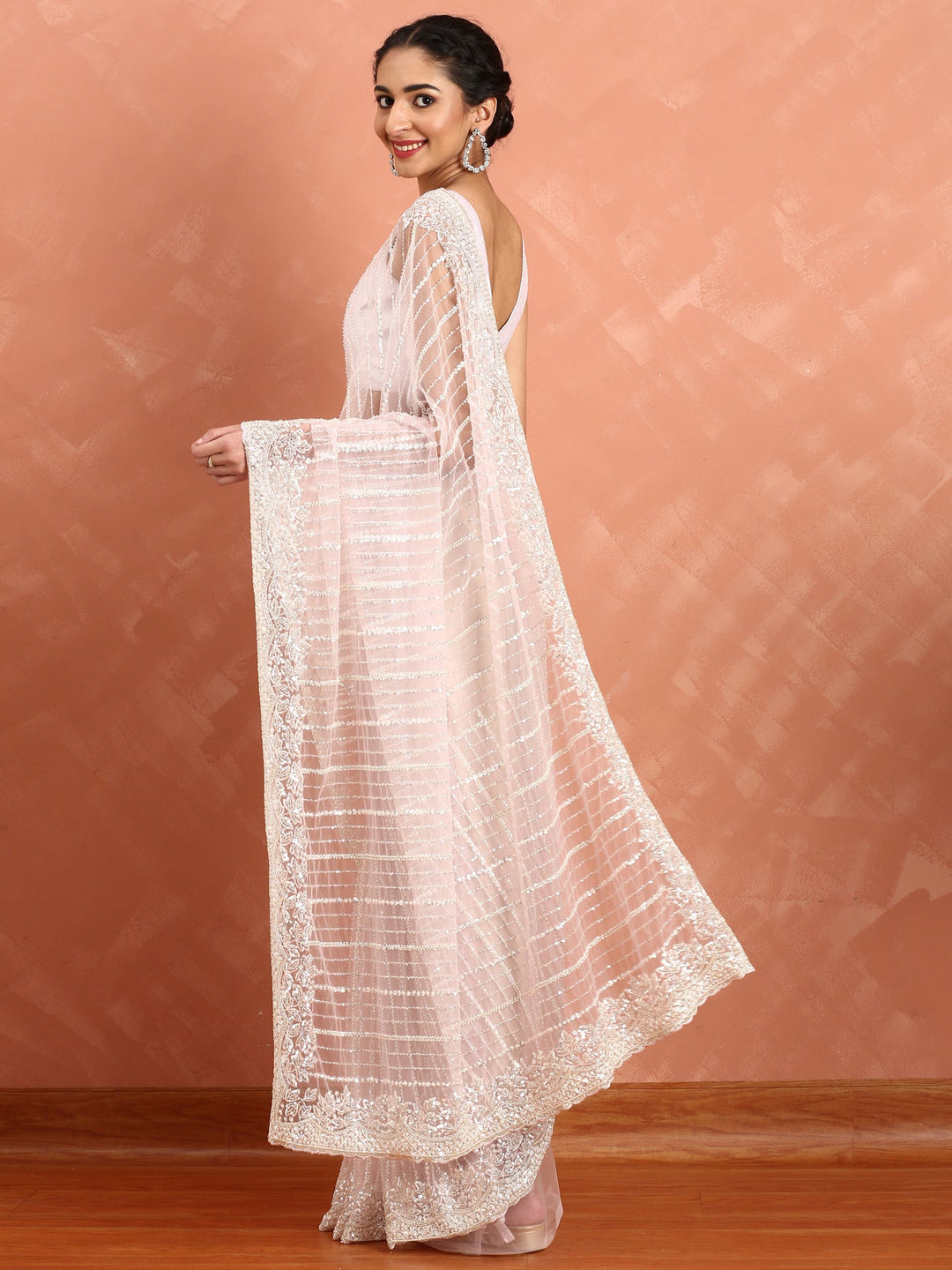 Neerus Pink net hand embroidered saree - back view