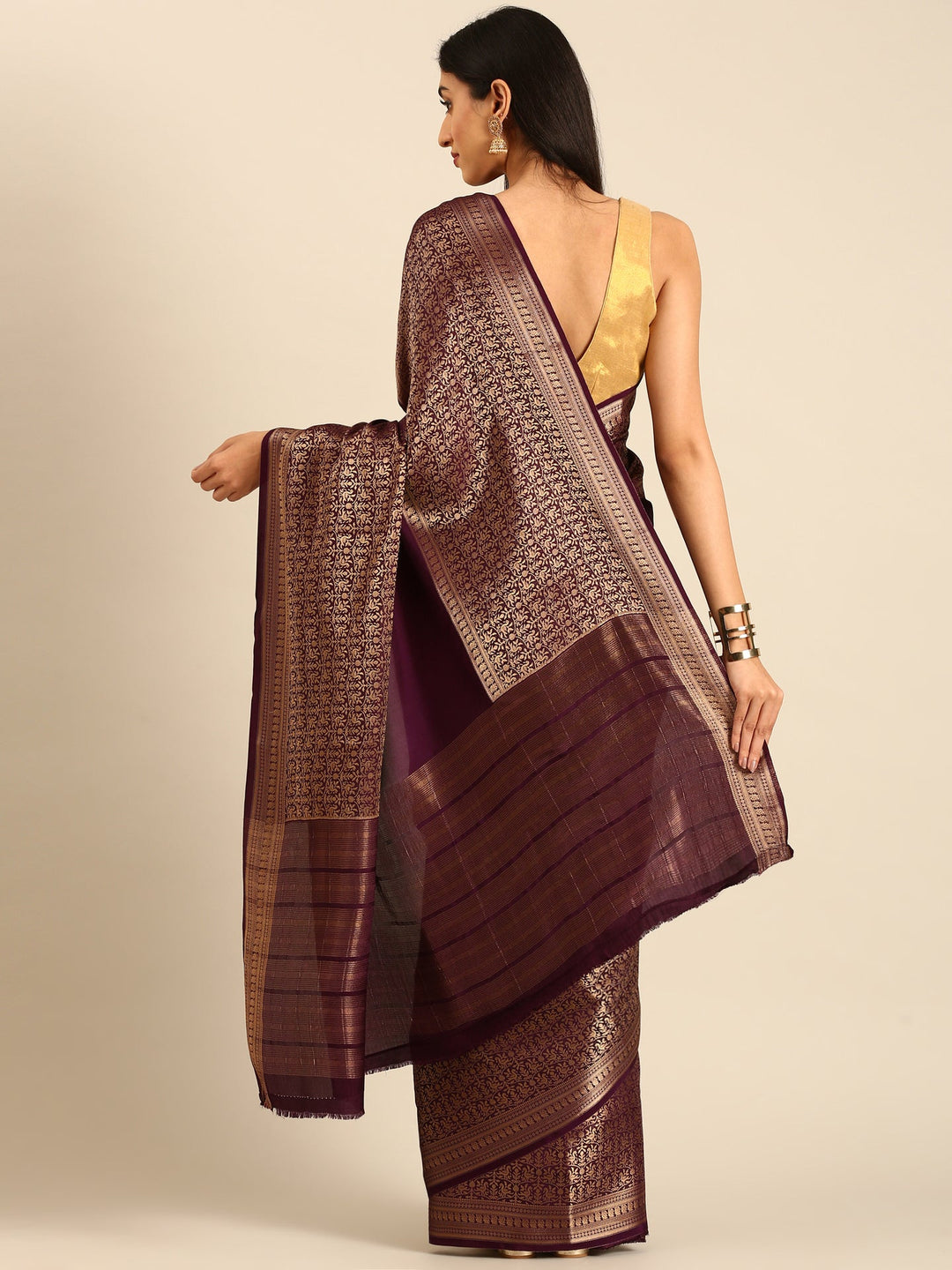 Neerus Maroon crepe woven saree with zari jaal border - back view