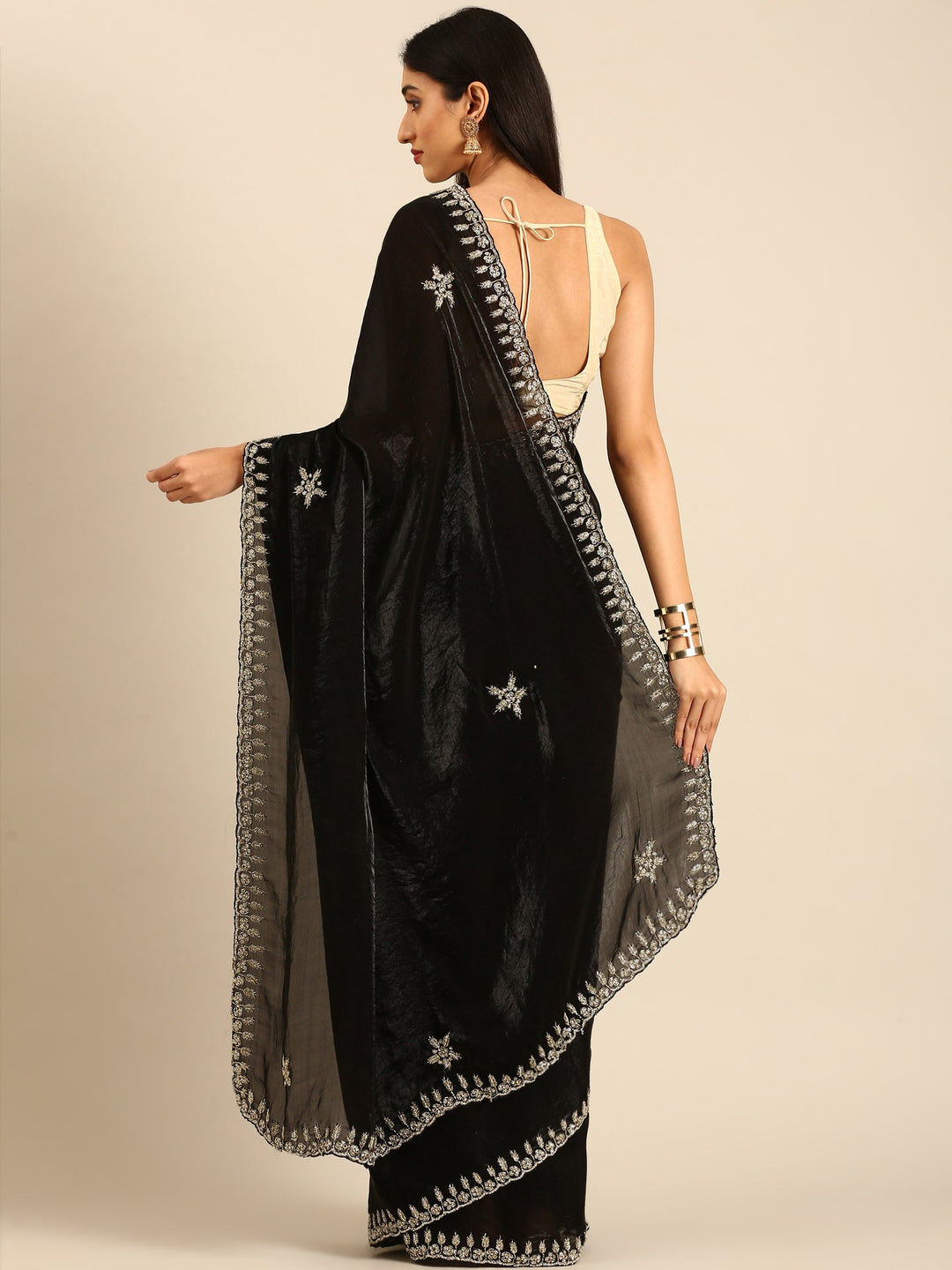 Neerus Black tissue embellished saree - back view