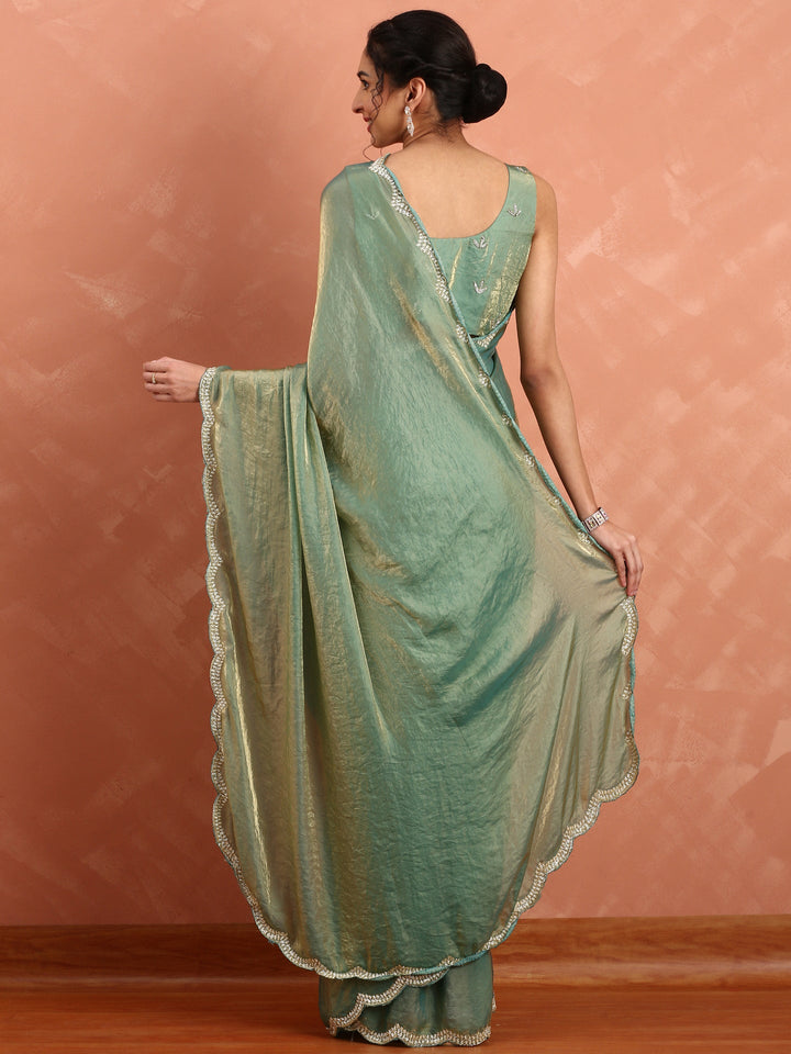 Green & gold Jimmy tissue saree with hand embroidery with ready made blouse