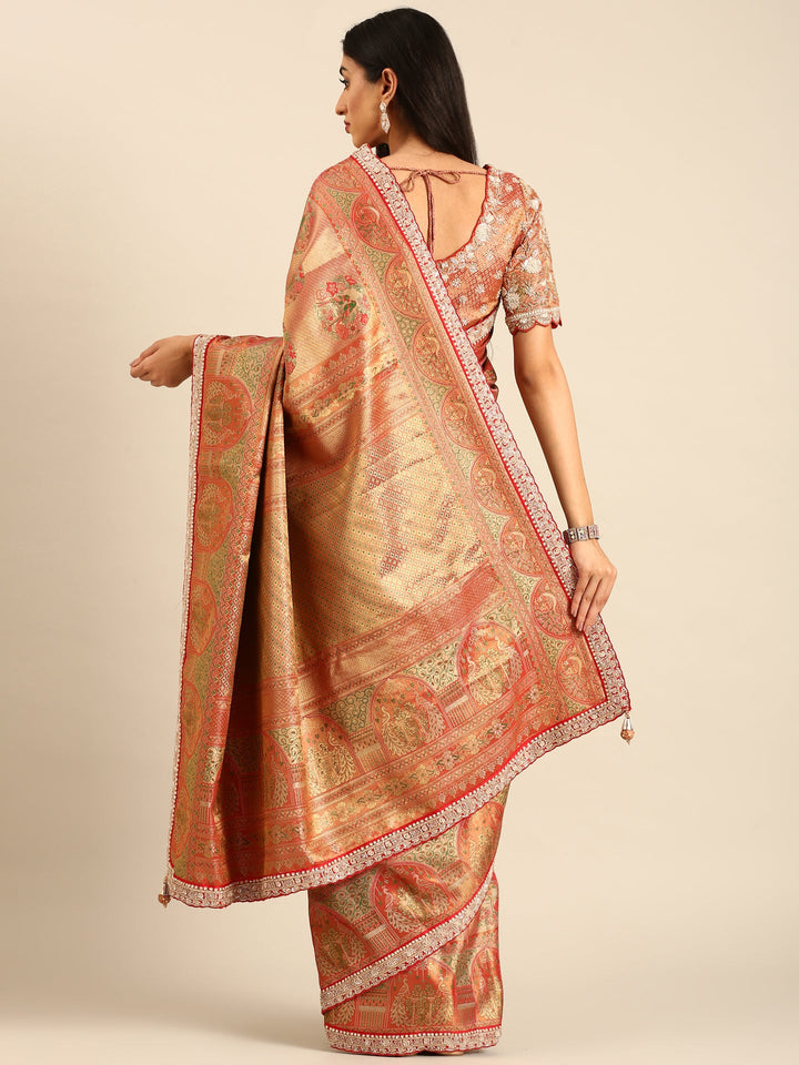 Neerus Red Banarasi hand embroidered saree with gold zardozi work - back view