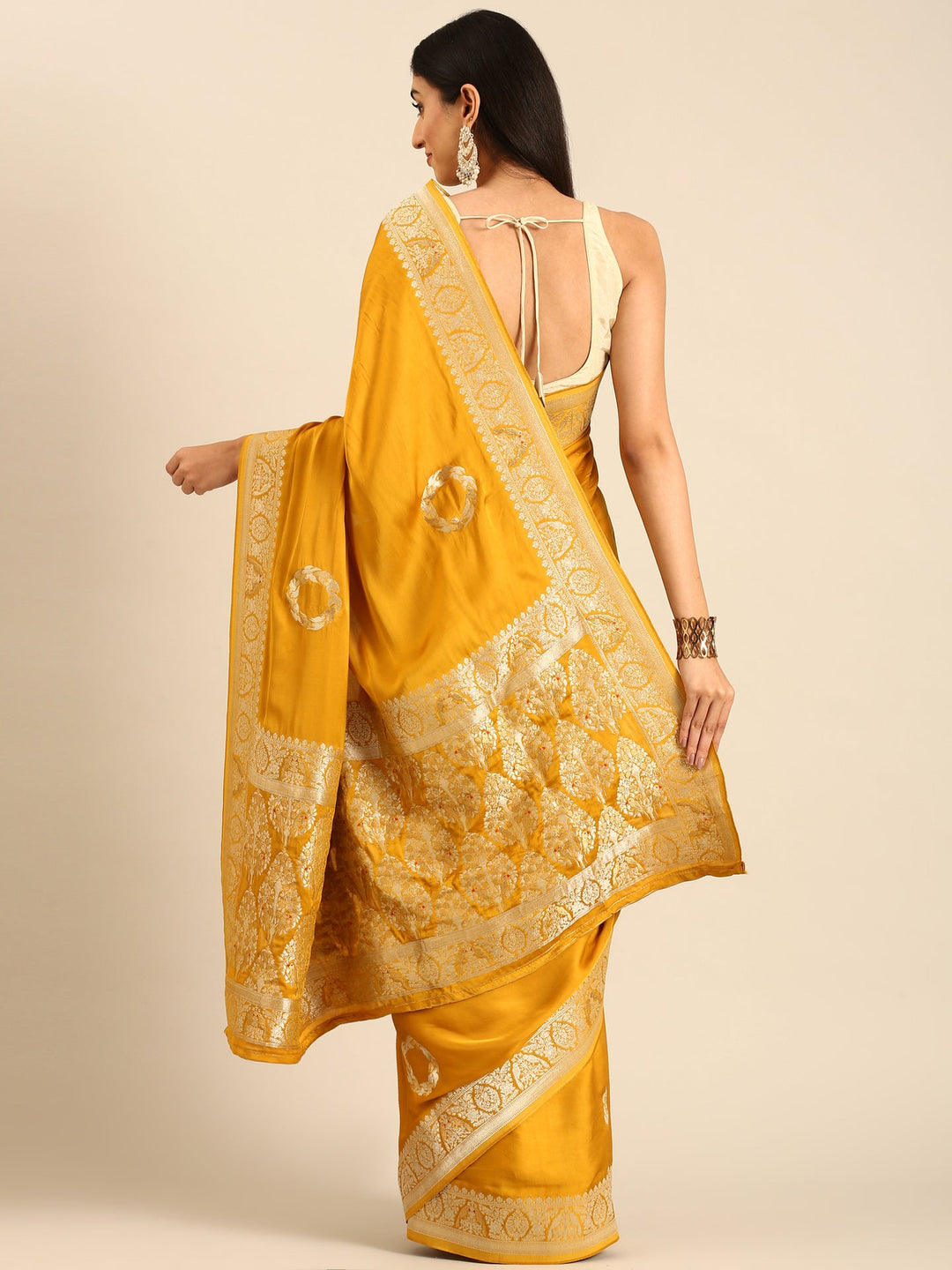 Neerus Yellow Banarasi woven saree with zari border - side view