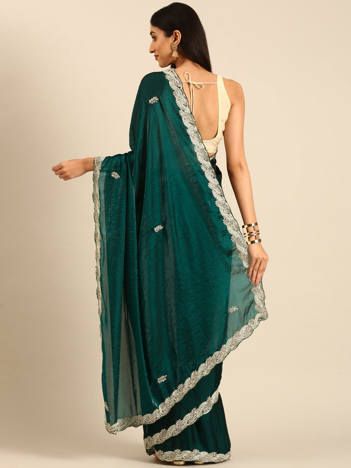 Green shimmer tissue saree with cut Dana & Swarovski embroidery