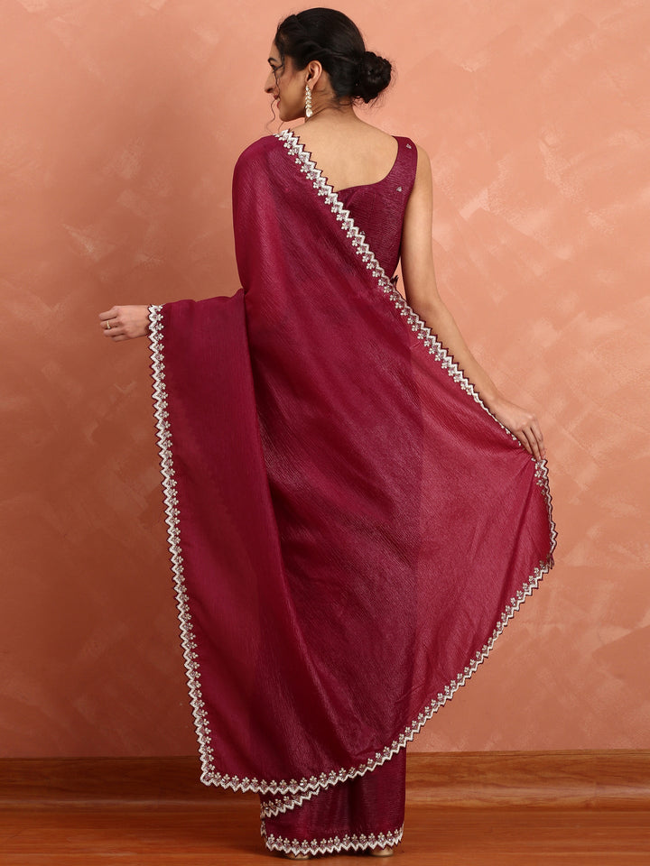 Neerus Maroon satin embellished saree - back view